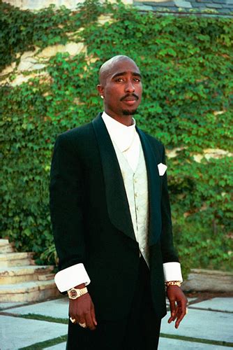 tupac wearing suit.